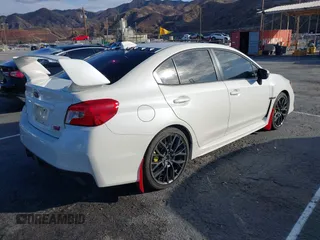 2019 Subaru WRX STI with VIN JF1VA2R61K9820260, listed as a IAAI auction lot 41426791 with 84,395 mi miles. Bid and sale history available at carsss.com. Image 4.