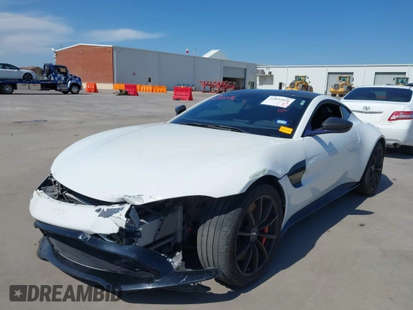 2019 Aston Martin Vantage z VIN SCFSMGAW4KGN01848, wystawiony jako IAAI lot #42032076 z przebiegiem 54 469 mil mil oraz . Historia ofert i sprzedaży dostępna na DreamBid. Obrazek 22.