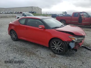 2014 Scion tC z VIN JTKJF5C79E3079305, wystawiony jako Copart lot #51750825 z przebiegiem 175 801 mil mil oraz Szkoda całkowita • Salvage title. Historia ofert i sprzedaży dostępna na DreamBid. Obrazek 4.