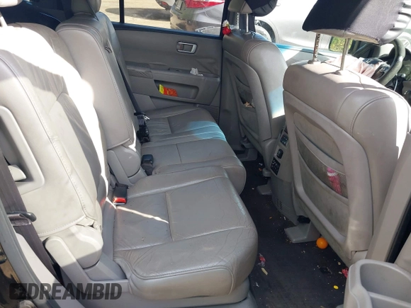 2011 Honda Pilot EX-L with VIN 5FNYF4H63BB004288, listed as a IAAI auction lot 42084984 with 215,019 mi miles and . Bid and sale history available at carsss.com. Image 8.