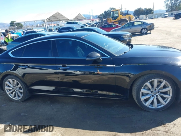 2018 Audi A5 Sportback Premium z VIN WAUANCF53JA009200, wystawiony jako IAAI lot #41725501 z przebiegiem 107 076 mil mil oraz . Historia ofert i sprzedaży dostępna na DreamBid. Obrazek 14.