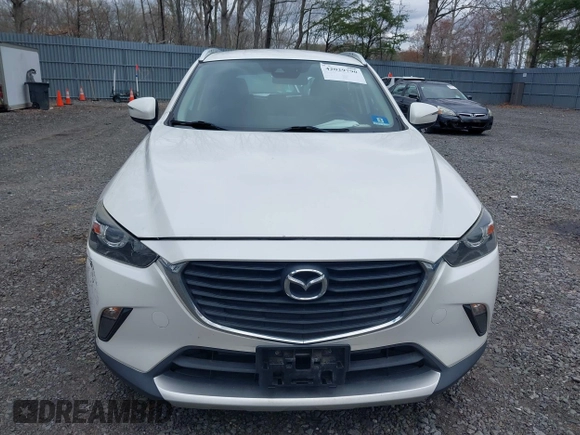 2018 Mazda CX-3 Touring with VIN JM1DKFC71J0315074, listed as a IAAI auction lot 42029790 with 100,268 mi miles. Bid and sale history available at carsss.com. Image 12.