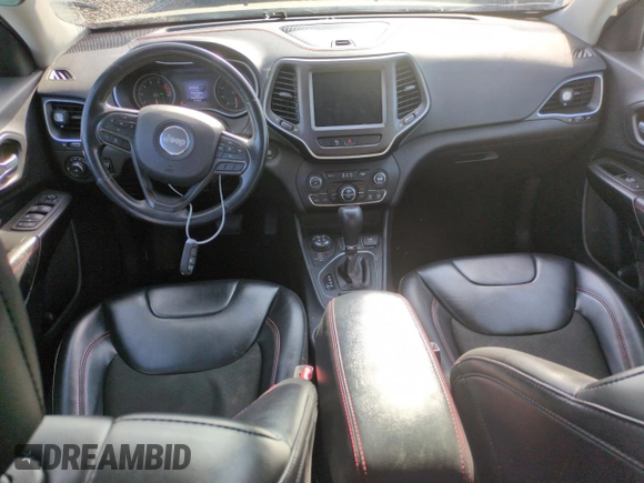 2020 Jeep Cherokee Trailhawk с VIN 1C4PJMBX6LD608552, выставлен на аукционе Copart как лот 52159995 с пробегом 84 368 миль миль и Списание • Salvage title. История ставок и продаж доступна на DreamBid. Изображение 8.