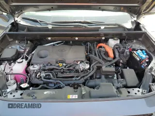 2024 Toyota RAV4 Hybrid LE with VIN JTMMWRFV7RD233242, listed as a Copart auction lot 60878815 with 11,064 mi miles and Salvage title. Bid and sale history available at DreamBid. Image 12.