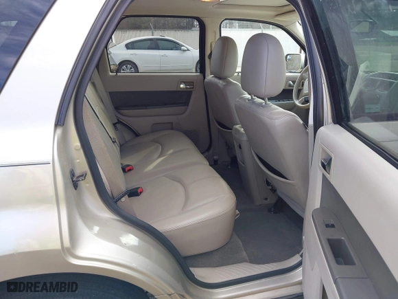 2010 Mercury Mariner Premier with VIN 4M2CN8HG4AKJ05736, listed as a IAAI auction lot 41744987 with 209,819 mi miles. Bid and sale history available at carsss.com. Image 8.