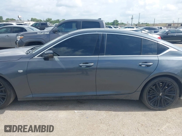 2021 Cadillac CT5 Premium Luxury z VIN 1G6DN5RK9M0111997, wystawiony jako IAAI lot #42715545 z przebiegiem 78 769 mil mil oraz . Historia ofert i sprzedaży dostępna na DreamBid. Obrazek 14.