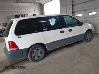 2006 Ford Freestar Cargo with VIN 2FTZA54666BA14556, listed as a IAAI auction lot 42103437 with 147,998 mi miles. Bid and sale history available at carsss.com. Image 4.