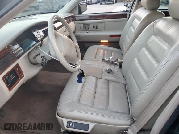 1995 Cadillac DeVille z VIN 1G6KD52B0SU252838, wystawiony jako Copart lot #87642595 z przebiegiem 72 847 mil mil oraz Szkoda całkowita • Salvage title. Historia ofert i sprzedaży dostępna na DreamBid. Obrazek 7.