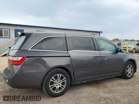 2013 Honda Odyssey EX-L with VIN 5FNRL5H68DB070079, listed as a Copart auction lot 52183895 with 173,428 mi miles and Clean title. Bid and sale history available at DreamBid. Image 3.