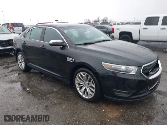 2015 Ford Taurus Limited with VIN 1FAHP2F87FG146554, listed as a IAAI auction lot 41712502 with 103,117 mi miles. Bid and sale history available at carsss.com. Image 1.
