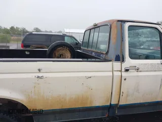 1988 Ford F-150 with VIN 2FTEF14Y6JCA33783, listed as a IAAI auction lot 42519893 with 1,135 mi miles and . Bid and sale history available at DreamBid. Image 8.