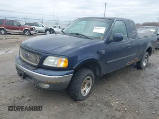 2003 Ford F-150 XL with VIN 1FTRX18W23NB34680, listed as a IAAI auction lot 42089079 with 1 mi miles. Bid and sale history available at carsss.com. Image 2.