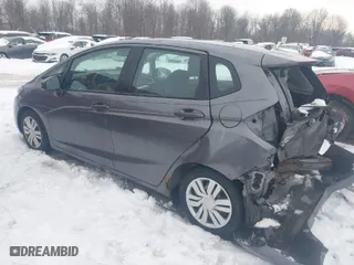 2015 Honda Fit LX with VIN 3HGGK5H53FM760016, listed as a IAAI auction lot 41447554 with 141,521 mi miles. Bid and sale history available at carsss.com. Image 3.
