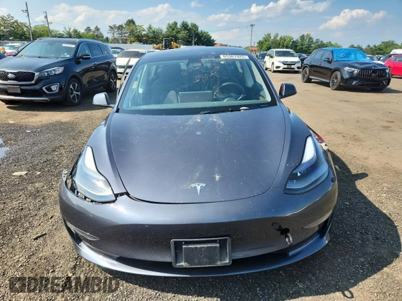 2023 Tesla Model 3 с VIN 5YJ3E1EAXPF594565, выставлен на аукционе Copart как лот 65361925 с пробегом Не указан миль и Списание • Salvage title. История ставок и продаж доступна на DreamBid. Изображение 5.
