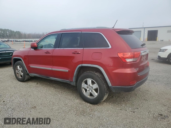 2011 Jeep Grand Cherokee Laredo with VIN 1J4RS4GG6BC704212, listed as a Copart auction lot 83753234 with 200,104 mi miles and Salvage Title. Bid and sale history available at DreamBid. Image 2.