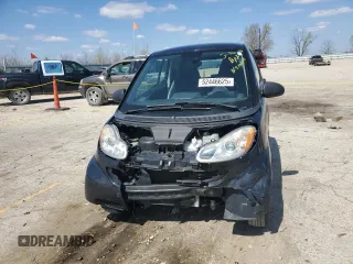 2009 Smart fortwo Pure z VIN WMEEJ31X49K219479, wystawiony jako Copart lot #52446625 z przebiegiem 82 337 mil mil oraz Szkody całkowita. Historia ofert i sprzedaży dostępna na DreamBid. Obrazek 5.