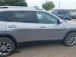 2021 Jeep Cherokee Altitude with VIN 1C4PJLLB2MD164004, listed as a IAAI auction lot 42083946 with 99,136 mi miles and . Bid and sale history available at DreamBid. Image 13.