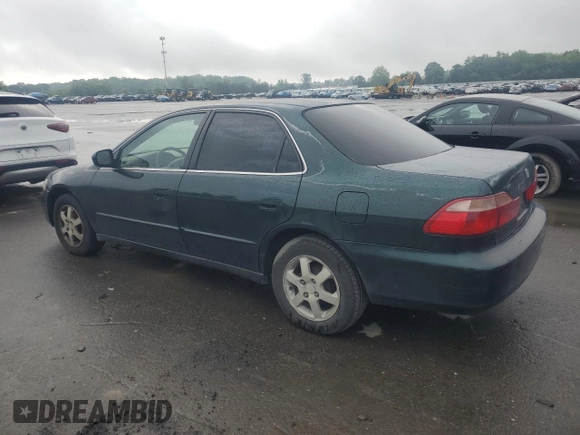 2000 Honda Accord SE with VIN 1HGCG6692YA141564, listed as a Copart auction lot 57423295 with 190,057 mi miles and Salvage title. Bid and sale history available at DreamBid. Image 2.