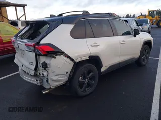 2021 Toyota RAV4 Hybrid XSE with VIN 4T3E6RFV8MU056524, listed as a IAAI auction lot 41788452 with 56,751 mi miles. Bid and sale history available at carsss.com. Image 4.