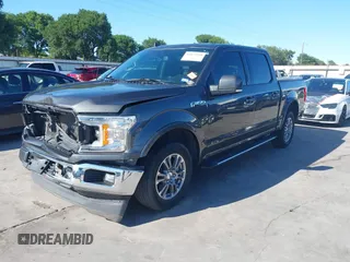 2020 Ford F-150 XL with VIN 1FTEW1C50LKE93690, listed as a IAAI auction lot 42075198 with 51,261 mi miles and . Bid and sale history available at DreamBid. Image 2.