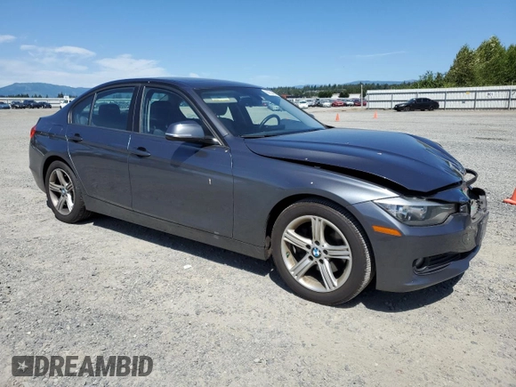 2014 BMW 3 Series 320i with VIN WBA3B1C54EK132952, listed as a Copart auction lot 63653435 with 63,260 mi miles and Salvage title. Bid and sale history available at DreamBid. Image 4.