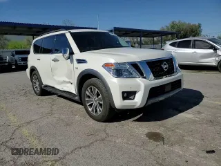 2019 Nissan Armada SL z VIN JN8AY2NDXK9087199, wystawiony jako Copart lot #56715045 z przebiegiem 56 930 mil mil oraz Szkoda całkowita • Salvage title. Historia ofert i sprzedaży dostępna na DreamBid. Obrazek 14.
