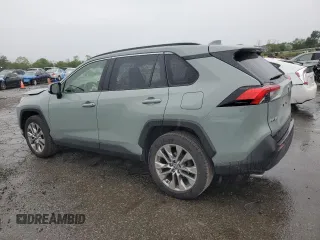 2021 Toyota RAV4 XLE Premium with VIN JTMA1RFV0MD074834, listed as a Copart auction lot 58466965 with 71,623 mi miles and Salvage title. Bid and sale history available at DreamBid. Image 2.