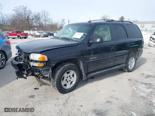 2002 GMC Yukon Denali with VIN 1GKEK63U42J306038, listed as a IAAI auction lot 41364932 with 262,253 mi miles. Bid and sale history available at carsss.com. Image 19.