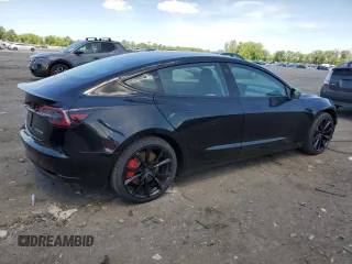 2020 Tesla Model 3 Performance z VIN 5YJ3E1EC8LF646755, wystawiony jako Copart lot #57224755 z przebiegiem 38 556 mil mil oraz Szkoda całkowita • Salvage title. Historia ofert i sprzedaży dostępna na DreamBid. Obrazek 3.