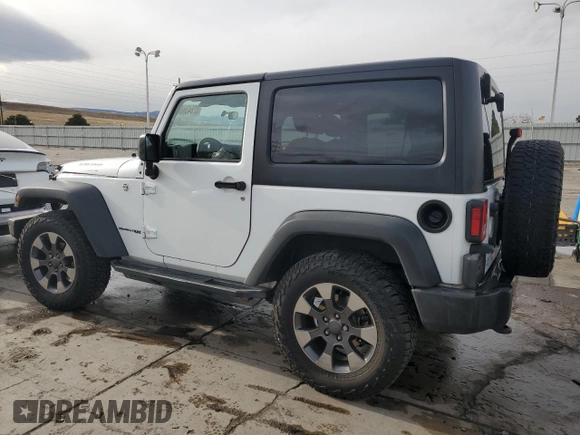 2018 Jeep Wrangler Sport S with VIN 1C4AJWAG1JL884708, listed as a Copart auction lot 82643804 with 80,002 mi miles and Salvage title. Bid and sale history available at DreamBid. Image 2.