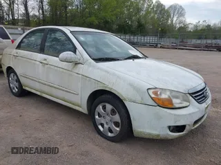 2007 Kia Spectra EX with VIN KNAFE121775394047, listed as a IAAI auction lot 42058880 with 112,222 mi miles. Bid and sale history available at carsss.com. Image 1.