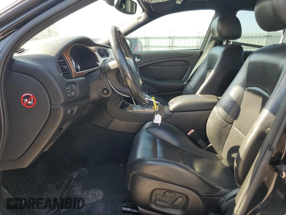 2005 Jaguar S-Type with VIN SAJWA03V251N28012, listed as a Copart auction lot 74417644 with 128,947 mi miles and Salvage Title. Bid and sale history available at DreamBid. Image 7.
