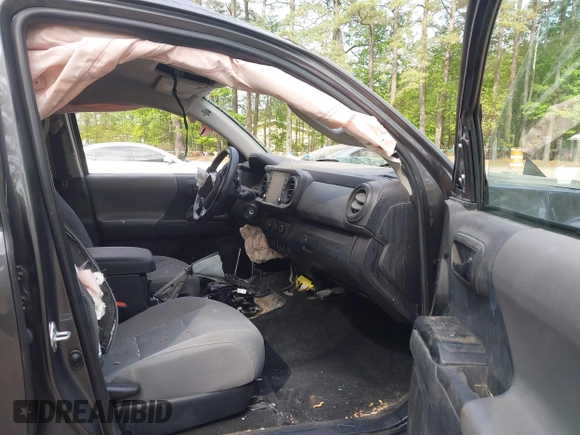 2022 Toyota Tacoma SR with VIN 3TYAX5GN1NT042099, listed as a IAAI auction lot 42081791 with 38,621 mi miles and . Bid and sale history available at DreamBid. Image 5.