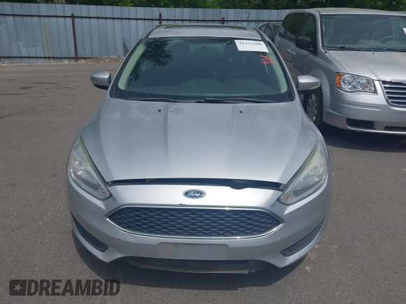 2016 Ford Focus SE with VIN 1FADP3F29GL294410, listed as a IAAI auction lot 42381200 with 154,659 mi miles and . Bid and sale history available at DreamBid. Image 6.