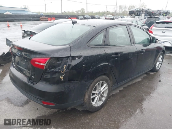 2016 Ford Focus SE with VIN 1FADP3F22GL229348, listed as a IAAI auction lot 42169543 with 173,818 mi miles and . Bid and sale history available at DreamBid. Image 4.