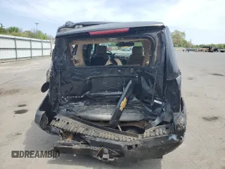 2012 Chevrolet Suburban LT with VIN 1GNSKJE77CR298049, listed as a Copart auction lot 61171865 with 247,737 mi miles and Salvage title. Bid and sale history available at DreamBid. Image 6.