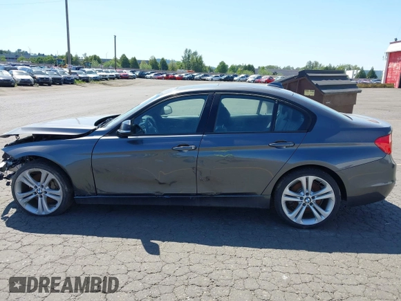 2012 BMW 3 Series 335i with VIN WBA3A9C5XCF077642, listed as a IAAI auction lot 42385611 with 119,251 mi miles and . Bid and sale history available at DreamBid. Image 14.