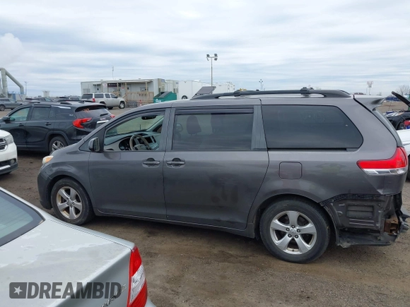 2012 Toyota Sienna XLE AAS with VIN 5TDYK3DC0CS252965, listed as a IAAI auction lot 42059909 with 321,983 mi miles and . Bid and sale history available at carsss.com. Image 14.