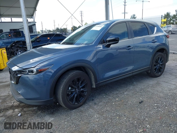 2023 Mazda CX-5 S Carbon Edition z VIN JM3KFBCM5P0179543, wystawiony jako IAAI lot #41950082 z przebiegiem 31 573 mil mil oraz . Historia ofert i sprzedaży dostępna na DreamBid. Obrazek 18.
