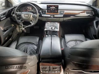 2015 Audi A8 3.0T z VIN WAU3GAFD7FN008548, wystawiony jako Copart lot #50428525 z przebiegiem 128 457 mil mil oraz Czysty tytuł • Clean title. Historia ofert i sprzedaży dostępna na DreamBid. Obrazek 8.