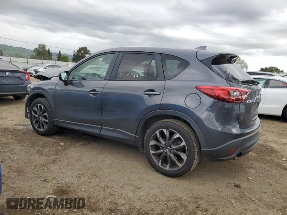 2016 Mazda CX-5 Grand Touring with VIN JM3KE2DY4G0795271, listed as a Copart auction lot 50986845 with 92,323 mi miles and Salvage Title. Bid and sale history available at carsss.com. Image 2.