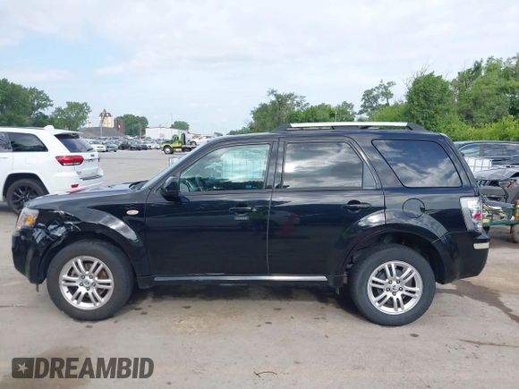 2009 Mercury Mariner Premier with VIN 4M2CU87GX9KJ20368, listed as a IAAI auction lot 42547760 with 155,665 mi miles and . Bid and sale history available at DreamBid. Image 14.