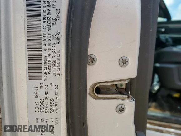 2018 Ram 1500 Lone Star Silver with VIN 1C6RR6LT6JS271714, listed as a Copart auction lot 60859665 with 181,034 mi miles and Salvage title. Bid and sale history available at DreamBid. Image 12.