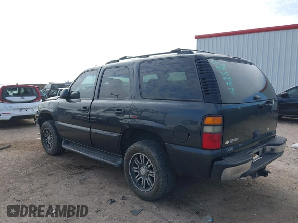 2006 Chevrolet Tahoe LS with VIN 1GNEC13V16J163907, listed as a IAAI auction lot 41232903 with 142,382 mi miles. Bid and sale history available at carsss.com. Image 3.