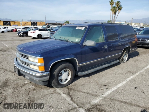 1999 Chevrolet Suburban with VIN 3GNEC16RXXG254126, listed as a Copart auction lot 52051405 with 113,554 mi miles and Clean title. Bid and sale history available at DreamBid. Image 1.
