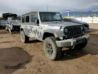 2015 Jeep Wrangler Unlimited Willys Wheeler with VIN 1C4BJWDG7FL690952, listed as a Copart auction lot 51493715 with 45,497 mi miles and Salvage Title. Bid and sale history available at DreamBid. Image 12.