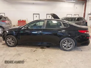 2019 Kia Optima LX with VIN 5XXGT4L31KG376856, listed as a IAAI auction lot 41427583 with 74,339 mi miles. Bid and sale history available at carsss.com. Image 14.
