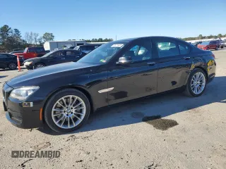 2015 BMW 7 Series 750i xDrive with VIN WBAYB6C57FD965993, listed as a Copart auction lot 83871924 with 76,720 mi miles and Salvage Title. Bid and sale history available at carsss.com. Image 1.