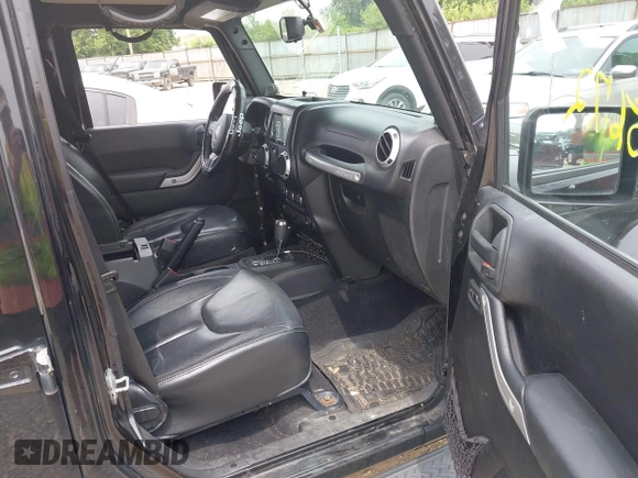 2014 Jeep Wrangler Unlimited Sahara with VIN 1C4HJWEG8EL292835, listed as a IAAI auction lot 42705672 with 176,769 mi miles and . Bid and sale history available at DreamBid. Image 5.