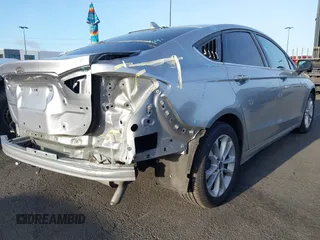 2020 Ford Fusion Hybrid SE with VIN 3FA6P0LU6LR171270, listed as a IAAI auction lot 41919266 with 106,438 mi miles. Bid and sale history available at carsss.com. Image 4.